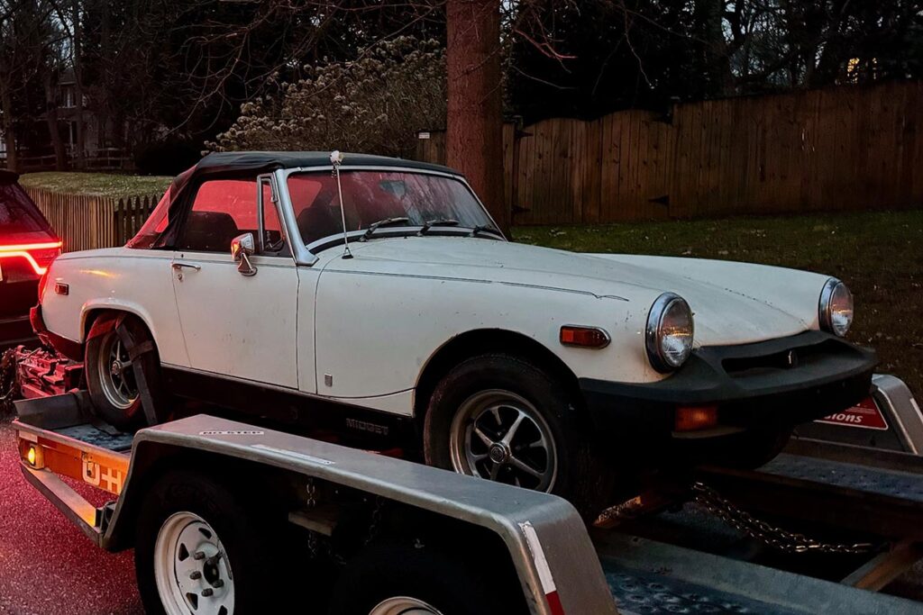 David Tarantelli and Natalie Ciavarella 1978 MG Midget